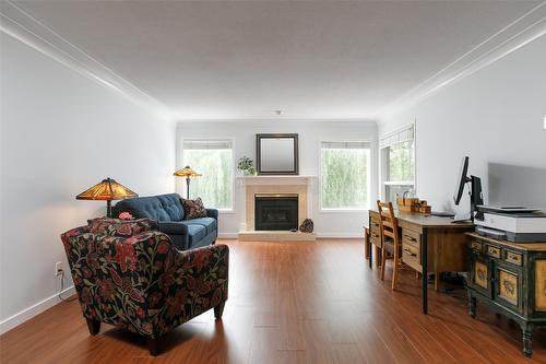 60-1101 Cameron Avenue, Kelowna, BC - Indoor Photo Showing Other Room With Fireplace