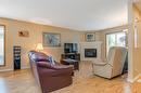 125-4035 Gellatly Road, West Kelowna, BC  - Indoor Photo Showing Living Room With Fireplace 