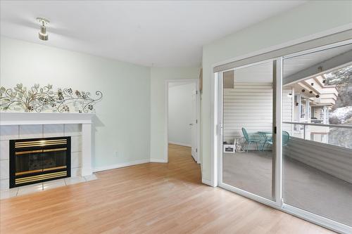 403-3806 35 Avenue, Vernon, BC - Indoor Photo Showing Living Room With Fireplace