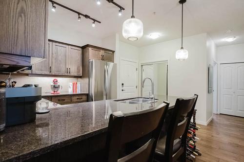 112-3739 Casorso Road, Kelowna, BC - Indoor Photo Showing Kitchen With Stainless Steel Kitchen With Double Sink With Upgraded Kitchen