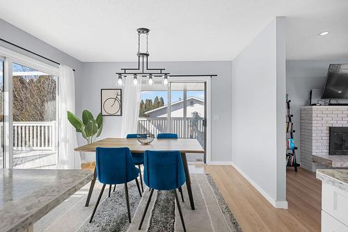 480 Eastbourne Road, Kelowna, BC - Indoor Photo Showing Dining Room With Fireplace