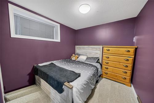 213 4Th Avenue, Cranbrook, BC - Indoor Photo Showing Bedroom