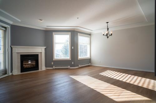 213-3300 Centennial Drive, Vernon, BC - Indoor Photo Showing Living Room With Fireplace