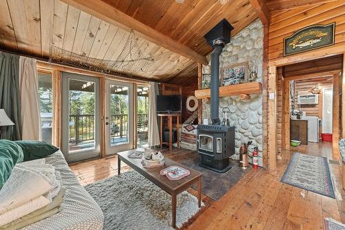 11190 3A Highway, Sanca, BC - Indoor Photo Showing Living Room With Fireplace