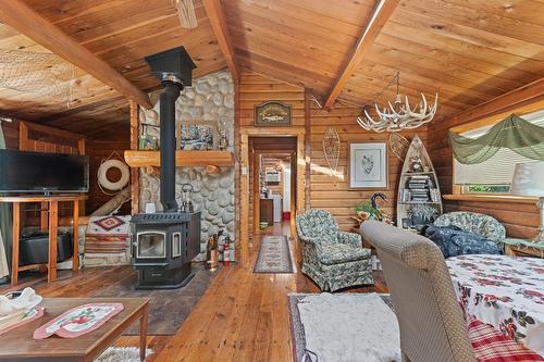 11190 3A Highway, Sanca, BC - Indoor Photo Showing Living Room With Fireplace