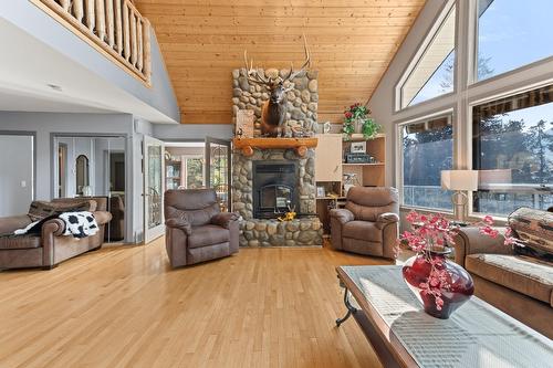 11190 3A Highway, Sanca, BC - Indoor Photo Showing Living Room With Fireplace