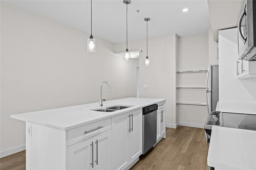 406-3638 Mission Springs Drive, Kelowna, BC - Indoor Photo Showing Kitchen With Double Sink