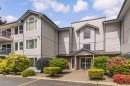 203-435 Morison Ave, Parksville, BC  - Outdoor With Balcony With Facade 