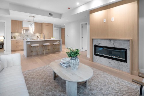 303-5229 Cordova Bay Rd, Saanich, BC - Indoor Photo Showing Living Room With Fireplace