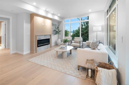 303-5229 Cordova Bay Rd, Saanich, BC - Indoor Photo Showing Living Room With Fireplace