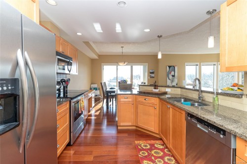 404-125 Aldersmith Pl, View Royal, BC - Indoor Photo Showing Kitchen With Double Sink With Upgraded Kitchen