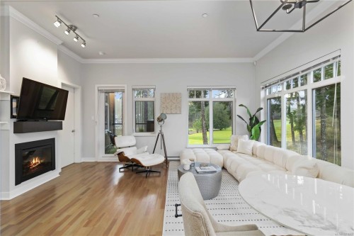 420-1395 Bear Mountain Pkwy, Langford, BC - Indoor Photo Showing Living Room With Fireplace