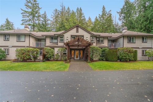 205-440 Schley Pl, Qualicum Beach, BC - Outdoor With Balcony With Facade