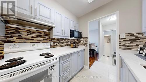 1001 - 25 Silver Springs Boulevard, Toronto, ON - Indoor Photo Showing Kitchen