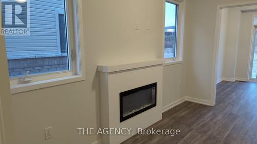 2036 Horace Duncan Crescent, Oshawa, ON - Indoor Photo Showing Other Room With Fireplace