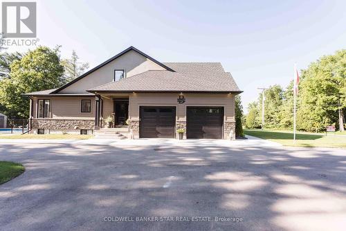 2 car garage with basement access. - 8037 Springwater Road, Central Elgin, ON 