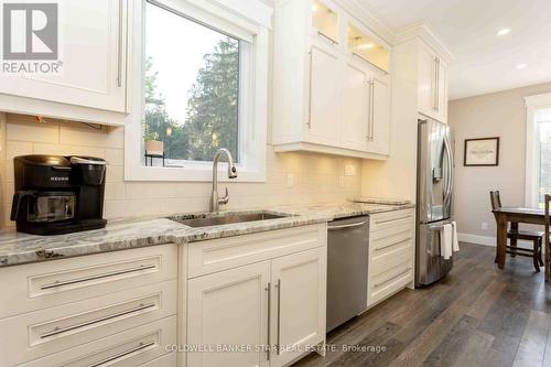 Sleek white cabinetry. - 8037 Springwater Road, Central Elgin, ON 
