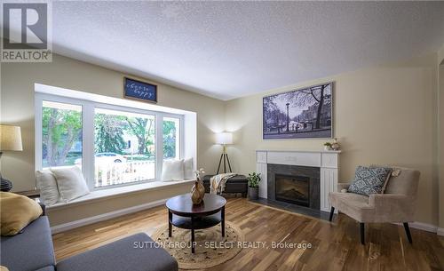 Upper - 6 Kirkton Court, London North (North H), ON - Indoor Photo Showing Living Room With Fireplace