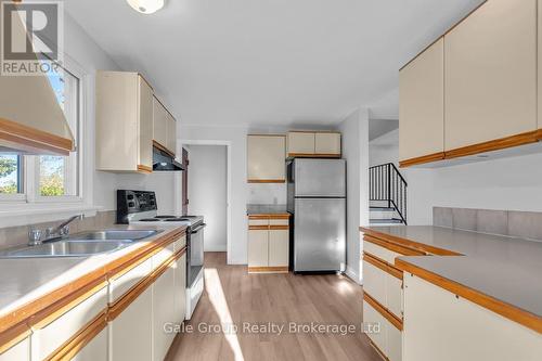 Kitchen - 63 Tennyson Street, Woodstock (Woodstock - South), ON - Indoor Photo Showing Kitchen With Double Sink