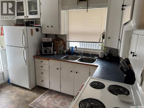 1134 Main Street, Saskatoon, SK - Indoor Photo Showing Kitchen With Double Sink