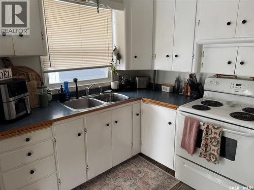 1134 Main Street, Saskatoon, SK - Indoor Photo Showing Kitchen With Double Sink