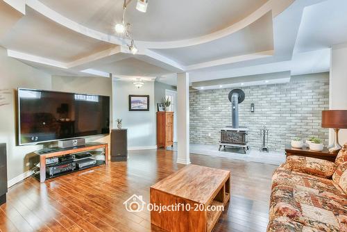 Salle familiale - 113 Rue De L'Émeraude, Saint-Colomban, QC - Indoor Photo Showing Living Room
