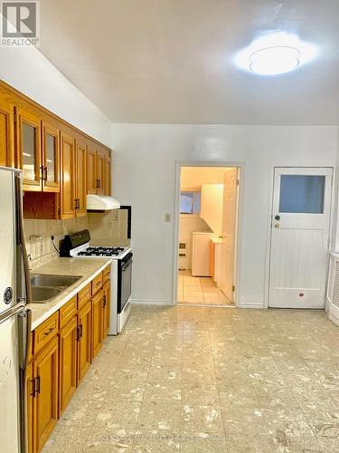1 - 176 Grace Street, Toronto, ON - Indoor Photo Showing Kitchen With Double Sink