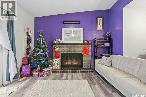1307 Brown Street, Regina, SK - Indoor Photo Showing Living Room With Fireplace