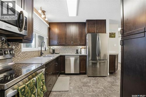 1307 Brown Street, Regina, SK - Indoor Photo Showing Kitchen With Double Sink