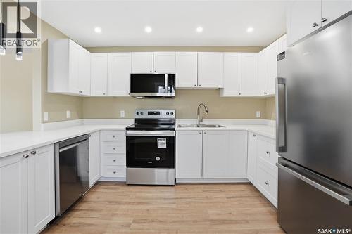 5100 Dewdney Avenue, Regina, SK - Indoor Photo Showing Kitchen With Stainless Steel Kitchen With Double Sink
