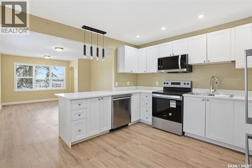 5100 Dewdney Avenue, Regina, SK - Indoor Photo Showing Kitchen With Stainless Steel Kitchen With Double Sink