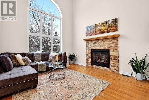 143 Borealis Crescent, Ottawa, ON - Indoor Photo Showing Living Room With Fireplace