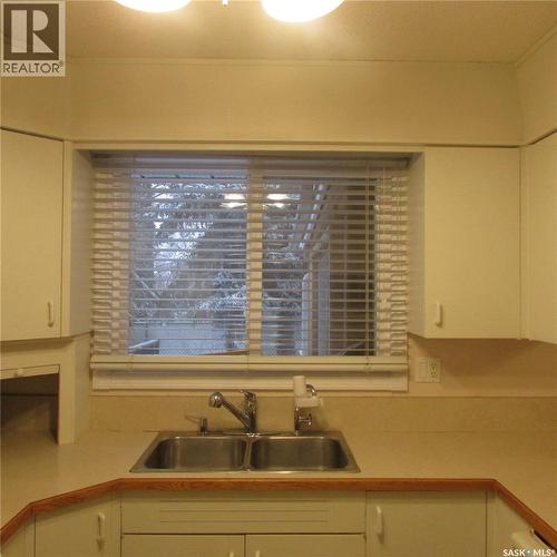 11 Watts Bay, Regina, SK - Indoor Photo Showing Kitchen With Double Sink