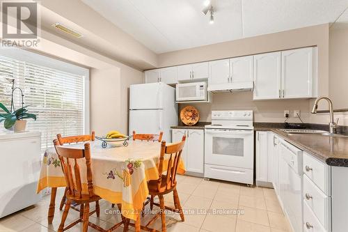 111 - 1450 Bishops Gate, Oakville (Ga Glen Abbey), ON - Indoor Photo Showing Kitchen