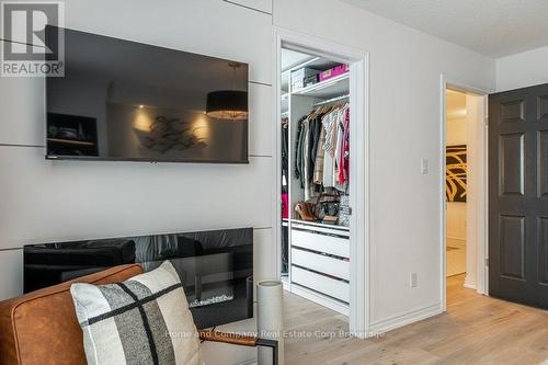 Primary Bedroom w Electric Fireplace + Walk-In - 138 Brown Street, Stratford, ON - Indoor With Fireplace