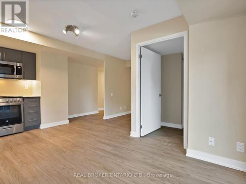 405 - 38 Monte Kwinter Court, Toronto, ON - Indoor Photo Showing Kitchen