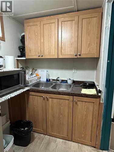 629 George Street, Estevan, SK - Indoor Photo Showing Kitchen With Double Sink