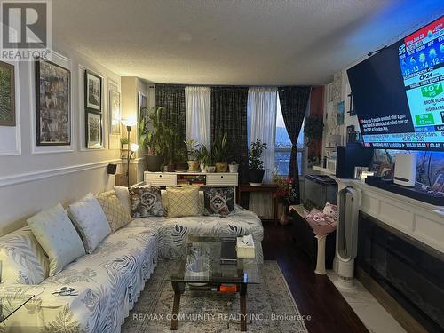 1604 - 370 Dixon Road, Toronto, ON - Indoor Photo Showing Living Room With Fireplace