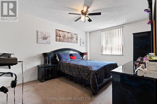 205 - 6390 Huggins Street, Niagara Falls (Stamford), ON - Indoor Photo Showing Bedroom