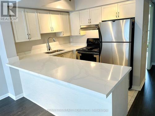 2084 - 65 George Appleton Way, Toronto, ON - Indoor Photo Showing Kitchen With Double Sink