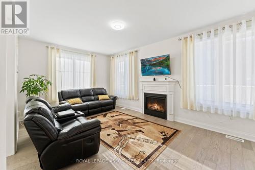 15 Farringdon Crescent, Brampton, ON - Indoor Photo Showing Living Room With Fireplace