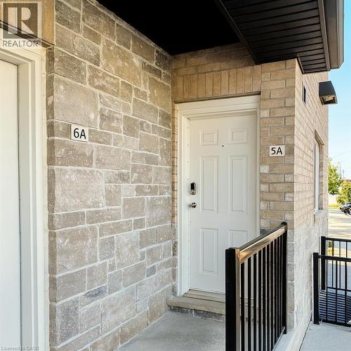Entrance to property with stone siding - 185 Windale Crescent Unit# 5A, Kitchener, ON - Outdoor With Exterior