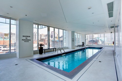 Piscine - 603-1155 Rue De La Montagne, Montréal (Ville-Marie), QC - Indoor Photo Showing Other Room With In Ground Pool