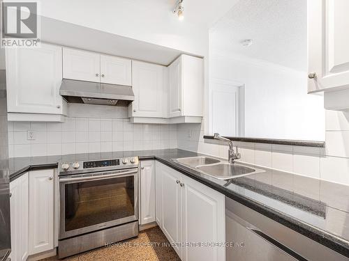 719 - 10 Delisle Avenue, Toronto, ON - Indoor Photo Showing Kitchen With Stainless Steel Kitchen With Double Sink