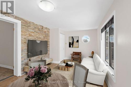 This photograph has been virtually staged - 5584 Manotick Main Street, Ottawa, ON - Indoor Photo Showing Living Room