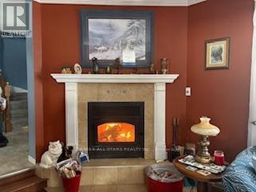 506 Snug Harbour Road, Kawartha Lakes (Lindsay), ON - Indoor Photo Showing Living Room With Fireplace