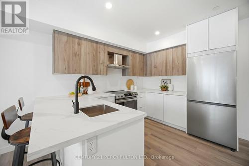 201 - 61 Orchard Park Drive, Toronto, ON - Indoor Photo Showing Kitchen With Upgraded Kitchen