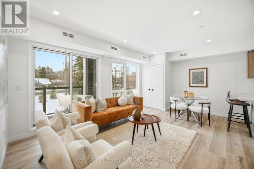 201 - 61 Orchard Park Drive, Toronto, ON - Indoor Photo Showing Living Room