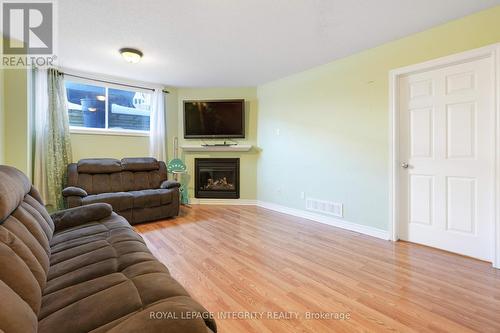 901 Ashenvale Way, Ottawa, ON - Indoor Photo Showing Living Room With Fireplace