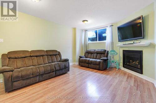 901 Ashenvale Way, Ottawa, ON - Indoor Photo Showing Living Room With Fireplace